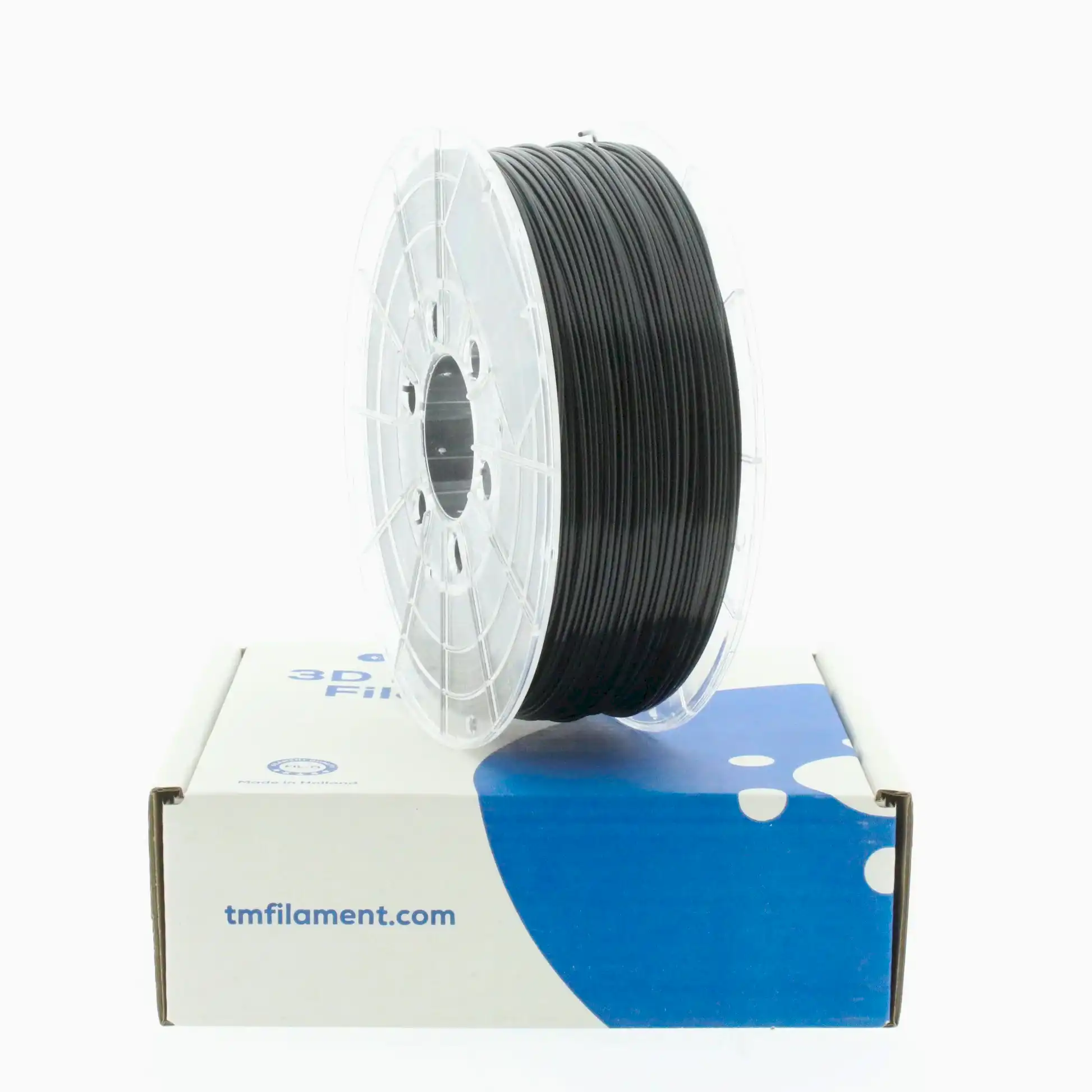Traffic Black PLA 3D Printer Filament with a diameter of 1.75mm on a 1KG Spool on top of a box.